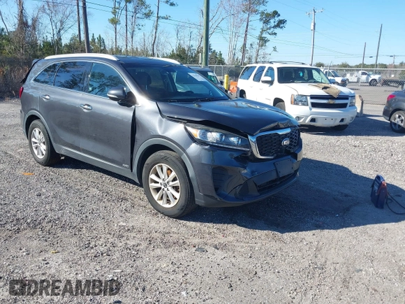 2019 Kia Sorento LX with VIN 5XYPGDA3XKG436510, listed as a IAAI auction lot 41010237 with 123,368 mi miles and . Bid and sale history available at carsss.com. Image 1.