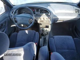 1995 Ford Contour z VIN 1FALP67L8SK186282, wystawiony jako Copart lot #87801845 z przebiegiem 81 611 mil mil oraz Szkody całkowita. Historia ofert i sprzedaży dostępna na DreamBid. Obrazek 8.