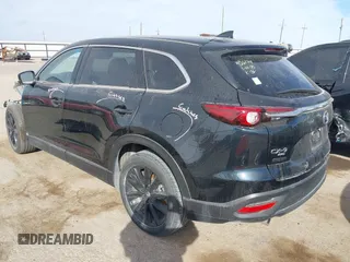 2023 Mazda CX-9 Touring Plus with VIN JM3TCBAY9P0649348, listed as a IAAI auction lot 41519499 with 23,749 mi miles and . Bid and sale history available at DreamBid. Image 3.
