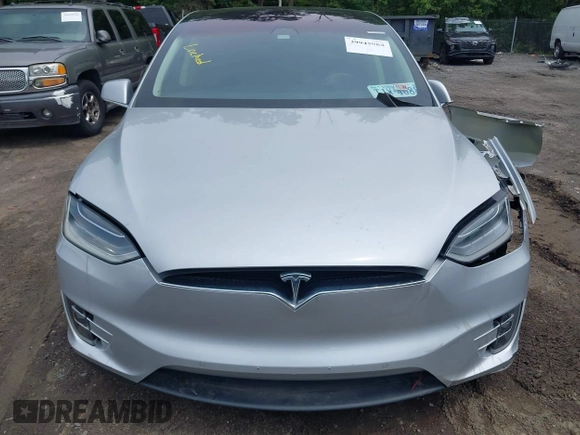 2016 Tesla Model X 70D z VIN 5YJXCAE25GF022898, wystawiony jako IAAI lot #39945988 z przebiegiem Nie podano mil oraz . Historia ofert i sprzedaży dostępna na DreamBid. Obrazek 11.