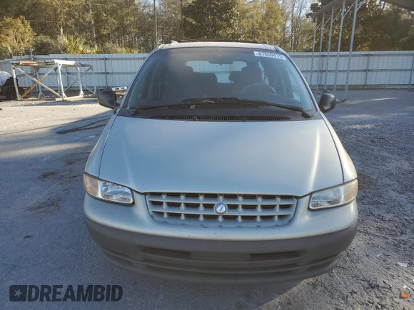 1999 Plymouth Voyager Grand SE z VIN 2P4GP44G3XR431744, wystawiony jako Copart lot #87659415 z przebiegiem Nie podano mil oraz Szkody całkowita. Historia ofert i sprzedaży dostępna na DreamBid. Obrazek 5.