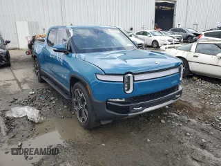 2023 Rivian R1T Adventure with VIN 7FCTGBAA5PN026063, listed as a Copart auction lot 66916194 with Not Provided miles and Salvage Title. Bid and sale history available at DreamBid. Image 4.
