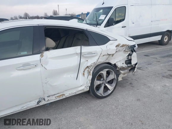 2020 Honda Accord Touring with VIN 1HGCV2F96LA011360, listed as a IAAI auction lot 41192112 with 64,643 mi miles and . Bid and sale history available at DreamBid. Image 6.