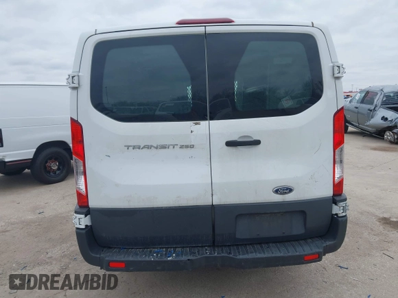 2015 Ford Transit Cargo with VIN 1FTNR1ZM0FKB02483, listed as a IAAI auction lot 41547400 with 317,720 mi miles and . Bid and sale history available at DreamBid. Image 14.
