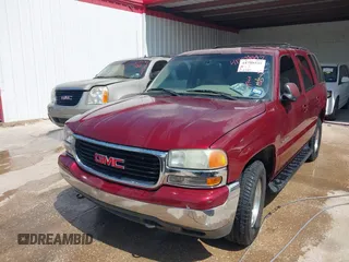 2002 GMC Yukon SLE with VIN 1GKEC13V12R116854, listed as a IAAI auction lot 41799335 with 270,063 mi miles. Bid and sale history available at carsss.com. Image 6.