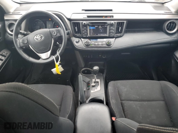 2018 Toyota RAV4 XLE with VIN 2T3RFREV8JW741461, listed as a Copart auction lot 57728244 with 88,925 mi miles and Salvage Title. Bid and sale history available at DreamBid. Image 8.