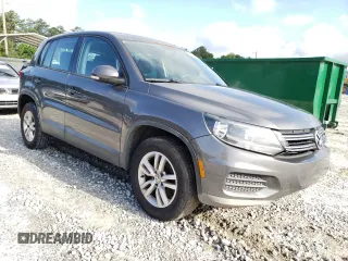 2014 Volkswagen Tiguan S z VIN WVGBV3AX2EW519798, wystawiony jako Copart lot #60316895 z przebiegiem 182 002 mil mil oraz Czysty tytuł • Clean title. Historia ofert i sprzedaży dostępna na DreamBid. Obrazek 4.
