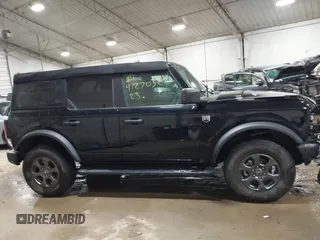 2023 Ford Bronco with VIN 1FMEE5BP1PLB34406, listed as a IAAI auction lot 41270327 with 25,536 mi miles. Bid and sale history available at carsss.com. Image 13.