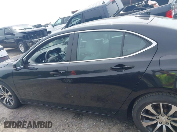 2015 Acura TLX Technology with VIN 19UUB1F50FA006163, listed as a IAAI auction lot 42279681 with 131,280 mi miles and . Bid and sale history available at DreamBid. Image 14.