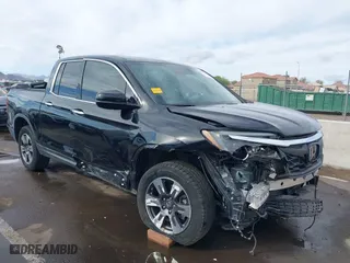 2017 Honda Ridgeline RTL-E with VIN 5FPYK3F7XHB030565, listed as a IAAI auction lot 41795386 with 79,252 mi miles. Bid and sale history available at carsss.com. Image 1.