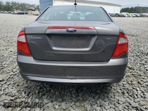2012 Ford Fusion SE with VIN 3FAHP0HA0CR355529, listed as a Copart auction lot 62585515 with 113,094 mi miles and Salvage title. Bid and sale history available at DreamBid. Image 6.