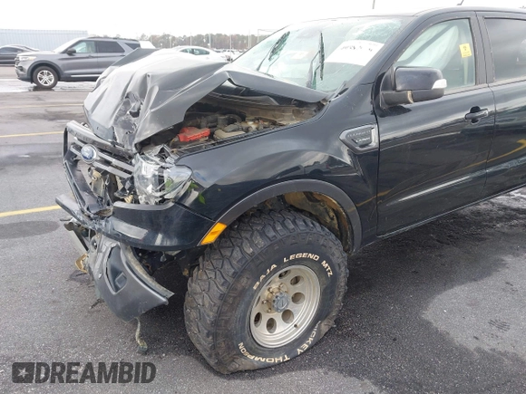 2019 Ford Ranger XL with VIN 1FTER4FH1KLA58099, listed as a IAAI auction lot 40887950 with 29,804 mi miles and . Bid and sale history available at DreamBid. Image 11.