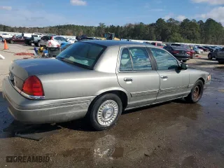 2000 Ford Crown Victoria with VIN 2FAFP73W0YX173874, listed as a Copart auction lot 82113564 with 108,425 mi miles and Salvage Title. Bid and sale history available at carsss.com. Image 3.