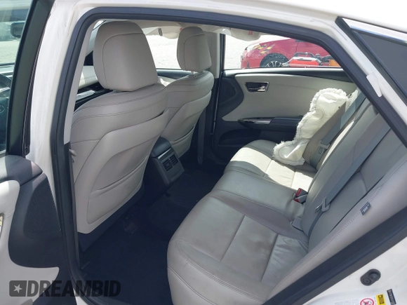 2014 Toyota Avalon Limited z VIN 4T1BK1EB1EU117097, wystawiony jako IAAI lot #41937996 z przebiegiem 169 336 mil mil oraz . Historia ofert i sprzedaży dostępna na DreamBid. Obrazek 8.