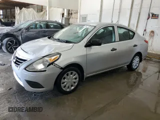 2015 Nissan Versa SV with VIN 3N1CN7AP0FL957164, listed as a Copart auction lot 64779705 with 125,675 mi miles and Salvage title. Bid and sale history available at DreamBid. Image 1.
