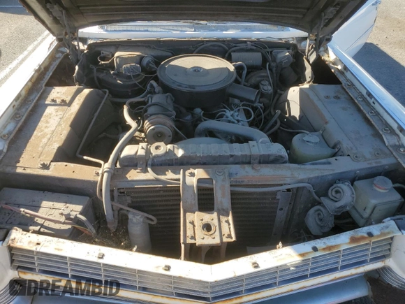 1964 Cadillac DeVille z VIN 64J117131, wystawiony jako Copart lot #79055844 z przebiegiem 75 803 mil mil oraz Czysty tytuł • Clean title. Historia ofert i sprzedaży dostępna na DreamBid. Obrazek 11.