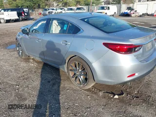 2017 Mazda 6 Grand Touring with VIN JM1GL1W50H1132261, listed as a IAAI auction lot 41930610 with 54,431 mi miles and . Bid and sale history available at DreamBid. Image 3.