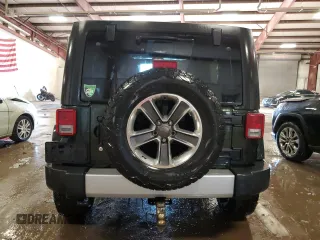 2011 Jeep Wrangler Unlimited Sahara with VIN 1J4BA5H17BL592752, listed as a Copart auction lot 83344334 with 176,259 mi miles and Clean Title. Bid and sale history available at carsss.com. Image 6.