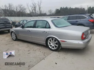 2004 Jaguar XJ with VIN SAJEA74C64SG08121, listed as a Copart auction lot 81736984 with 100,144 mi miles and Non Repairable. Bid and sale history available at DreamBid. Image 2.