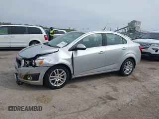2012 Chevrolet Sonic LT with VIN 1G1JC5SHXC4170853, listed as a IAAI auction lot 41941069 with 130,917 mi miles and . Bid and sale history available at DreamBid. Image 2.