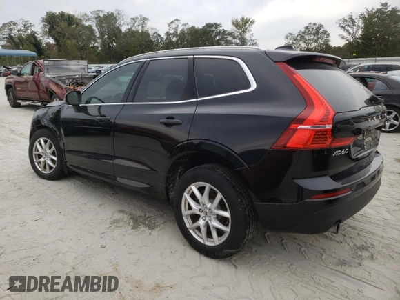 2018 Volvo XC60 Momentum with VIN LYV102RK1JB073418, listed as a Copart auction lot 73763614 with 64,692 mi miles and Salvage Title. Bid and sale history available at DreamBid. Image 2.