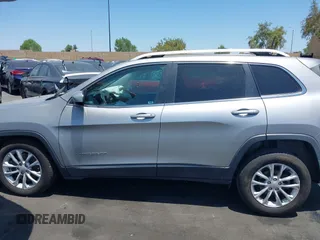 2019 Jeep Cherokee Latitude z VIN 1C4PJLCB8KD241701, wystawiony jako IAAI lot #42407536 z przebiegiem 59 006 mil mil oraz . Historia ofert i sprzedaży dostępna na DreamBid. Obrazek 15.