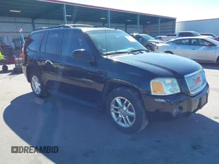 2008 GMC Envoy Denali with VIN 1GKET63M082175769, listed as a IAAI auction lot 41604135 with 136,013 mi miles. Bid and sale history available at carsss.com. Image 1.