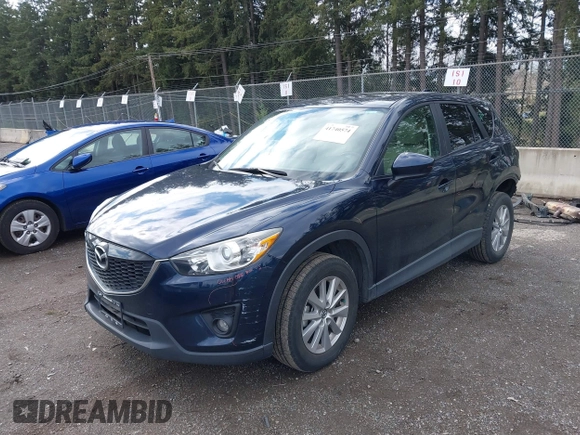 2015 Mazda CX-5 Touring with VIN JM3KE4CY5F0453646, listed as a IAAI auction lot 41740574 with 91,167 mi miles. Bid and sale history available at carsss.com. Image 19.
