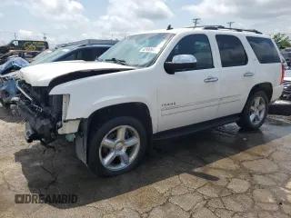 2014 Chevrolet Tahoe LTZ with VIN 1GNSKCE06ER205667, listed as a Copart auction lot 54498035 with 93,433 mi miles and Salvage title. Bid and sale history available at DreamBid. Image 1.
