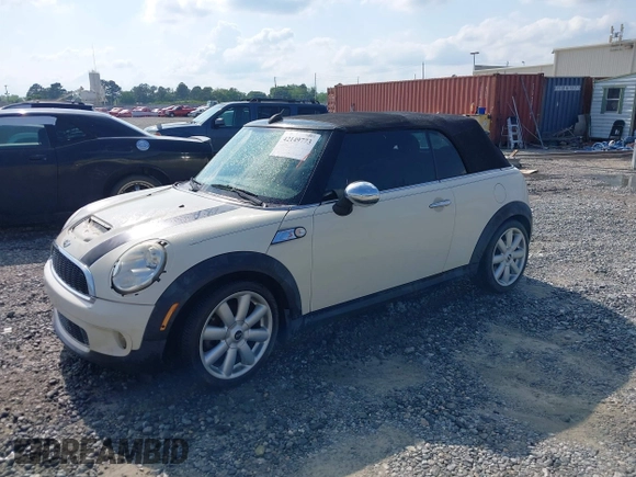 2010 MINI Convertible S with VIN WMWMS3C58ATY09098, listed as a IAAI auction lot 42149773 with 127,424 mi miles and . Bid and sale history available at DreamBid. Image 2.