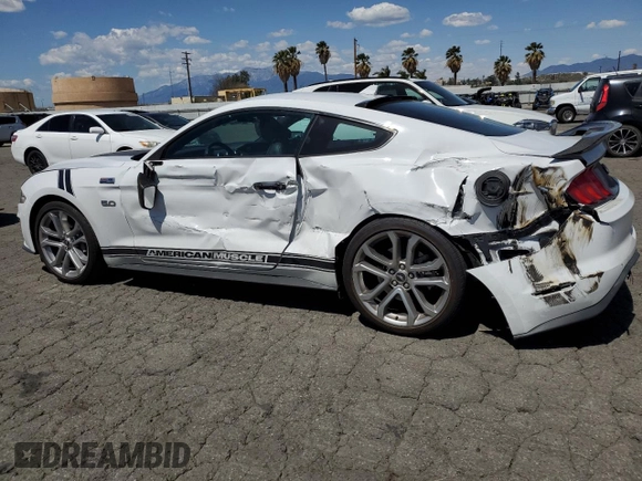 2022 Ford Mustang GT with VIN 1FA6P8CF9N5136633, listed as a Copart auction lot 51869985 with 34,974 mi miles and Salvage Title. Bid and sale history available at carsss.com. Image 2.