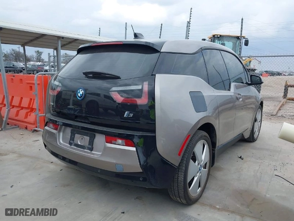 2014 BMW i3 with VIN WBY1Z4C54EVX62782, listed as a IAAI auction lot 41707914 with NaN miles. Bid and sale history available at carsss.com. Image 4.