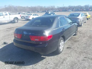 2005 Honda Accord LX with VIN 1HGCM66375A027799, listed as a IAAI auction lot 41904472 with 214,064 mi miles and . Bid and sale history available at DreamBid. Image 4.
