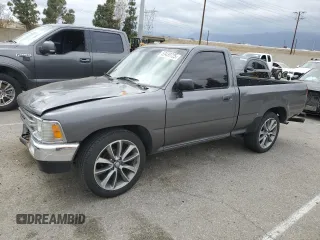 1989 Toyota Pickup with VIN JT4RN81R9K0009299, listed as a Copart auction lot 53438725 with 176,027 mi miles and Salvage title. Bid and sale history available at DreamBid. Image 1.