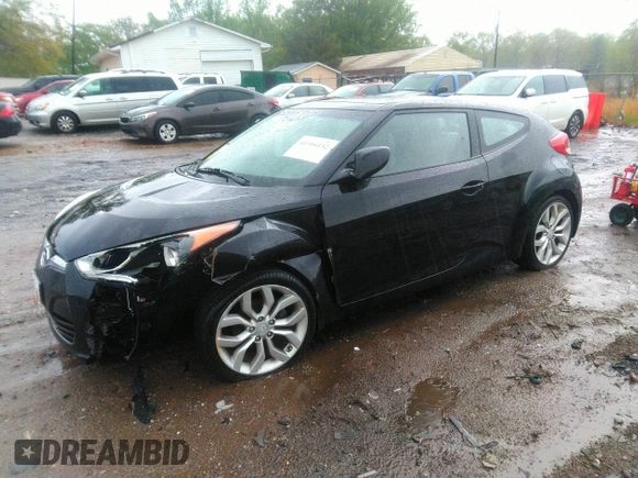 2012 Hyundai Veloster w/Gray Int with VIN KMHTC6AD2CU024382, listed as a IAAI auction lot 41980192 with 46,684 mi miles and . Bid and sale history available at DreamBid. Image 2.