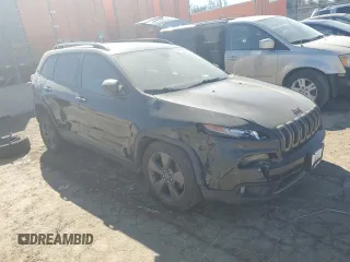2016 Jeep Cherokee 75th Anniversary with VIN 1C4PJLCB8GW290800, listed as a Copart auction lot 47258265 with 138,571 mi miles and Salvage Title. Bid and sale history available at carsss.com. Image 4.