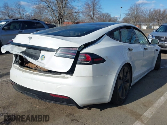 2022 Tesla Model S with VIN 5YJSA1E51NF491493, listed as a IAAI auction lot 41570494 with Not Provided miles and . Bid and sale history available at DreamBid. Image 4.