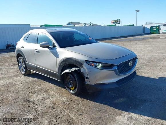 2023 Mazda CX-30 2.5 S Premium Package with VIN 3MVDMBDM5PM525771, listed as a IAAI auction lot 41476431 with 39,326 mi miles. Bid and sale history available at carsss.com. Image 1.
