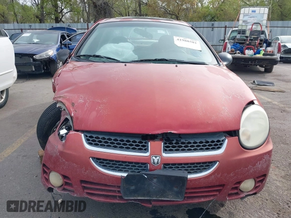 2004 Dodge Neon SXT with VIN 1B3ES56C04D504384, listed as a IAAI auction lot 41988581 with 166,602 mi miles. Bid and sale history available at carsss.com. Image 13.