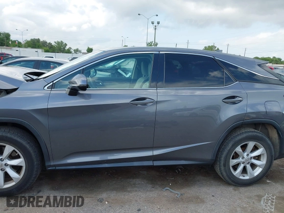 2016 Lexus RX 350 z VIN 2T2ZZMCA4GC032034, wystawiony jako IAAI lot #42095974 z przebiegiem 57 195 mil mil oraz . Historia ofert i sprzedaży dostępna na DreamBid. Obrazek 14.