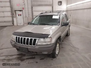 2003 Jeep Grand Cherokee Laredo with VIN 1J4GW48SX3C544237, listed as a IAAI auction lot 40823228 with 1 mi miles. Bid and sale history available at carsss.com. Image 6.