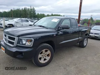 2009 Dodge Dakota with VIN 1D7HW32P09S798360, listed as a IAAI auction lot 42426400 with 50,988 mi miles and . Bid and sale history available at DreamBid. Image 2.
