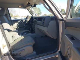 2007 Jeep Commander Sport z VIN 1J8HH48K77C587615, wystawiony jako IAAI lot #41149777 z przebiegiem 167 871 mil mil oraz . Historia ofert i sprzedaży dostępna na DreamBid. Obrazek 5.