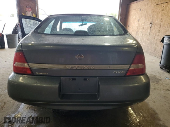 2000 Nissan Altima XE z VIN 1N4DL01D2YC237552, wystawiony jako Copart lot #57958785 z przebiegiem Nie podano mil oraz Szkoda całkowita • Salvage title. Historia ofert i sprzedaży dostępna na DreamBid. Obrazek 6.