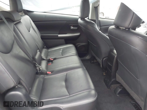 2016 Toyota Prius v Two with VIN JTDZN3EU8GJ041518, listed as a IAAI auction lot 41916830 with 106,526 mi miles. Bid and sale history available at carsss.com. Image 8.