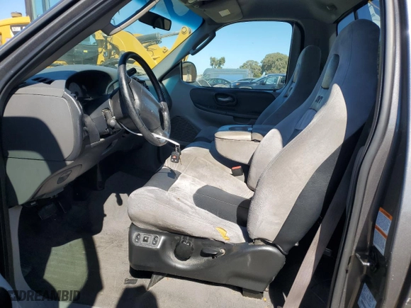 2004 Ford F-150 Heritage Lightning with VIN 2FTRF07354CA69559, listed as a Copart auction lot 73999214 with 256,082 mi miles and Salvage Title. Bid and sale history available at carsss.com. Image 7.