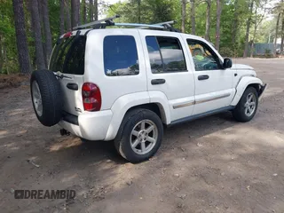 2006 Jeep Liberty Limited with VIN 1J4GL58K06W210025, listed as a IAAI auction lot 42189823 with 211,182 mi miles. Bid and sale history available at carsss.com. Image 4.