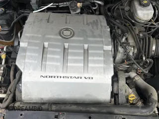 2004 Cadillac DeVille Limousine z VIN 1GEEH90Y24U550055, wystawiony jako Copart lot #57705855 z przebiegiem 44 345 mil mil oraz Tytuł czysty. Historia ofert i sprzedaży dostępna na DreamBid. Obrazek 7.