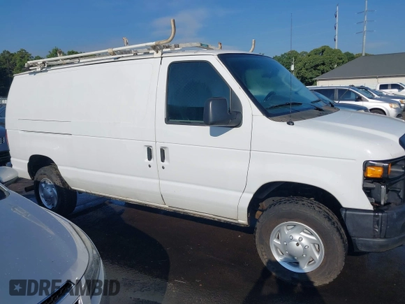 2014 Ford Econoline Cargo Commercial with VIN 1FTSE3EL9EDA49034, listed as a IAAI auction lot 42679719 with 217,659 mi miles and . Bid and sale history available at DreamBid. Image 13.
