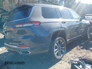 2022 Jeep Grand Cherokee Overland z VIN 1C4RJJDG6N8570854, wystawiony jako IAAI lot #40878737 z przebiegiem 19 947 mil mil oraz . Historia ofert i sprzedaży dostępna na DreamBid. Obrazek 4.
